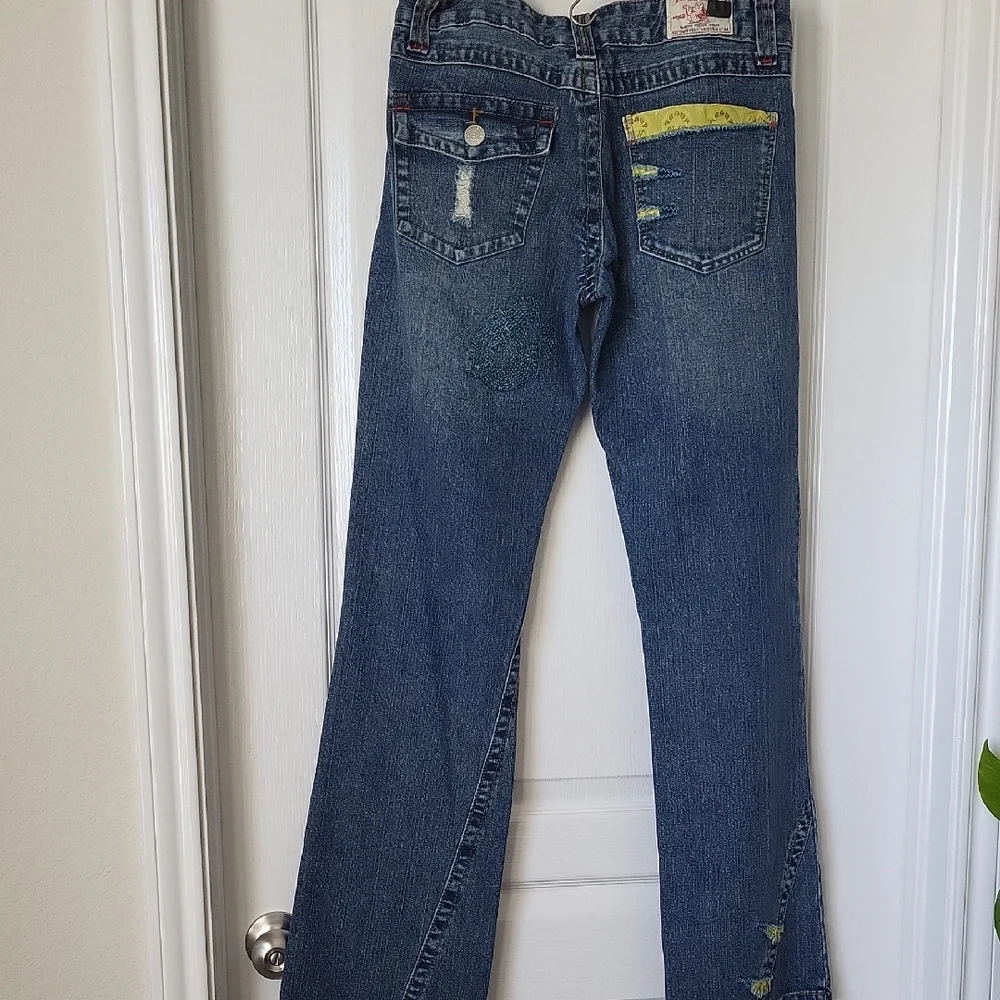 True Religion Denim Jeans With Yellow Accent Pocket. Row 29 Seat 34